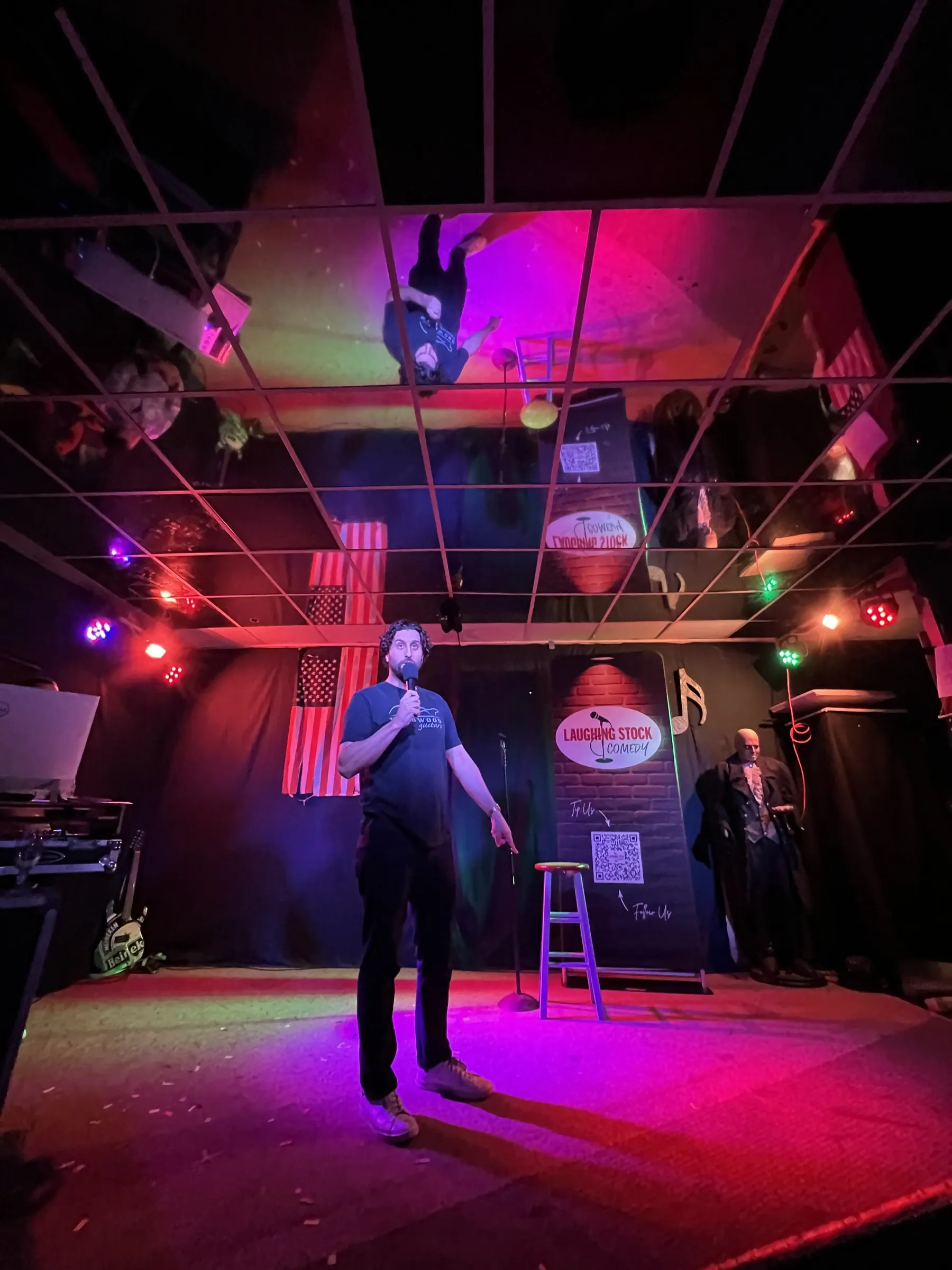A comic on stage at Lake Mary Pub & Tiki Bar